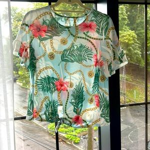 Chain and flower T shirt with tie front. Size medium.